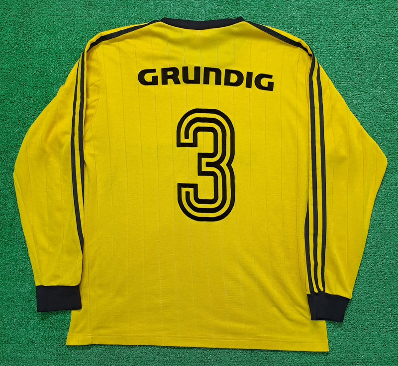 Camiseta T-shirt Adidas Grundig Vintage 80s Template Número 3